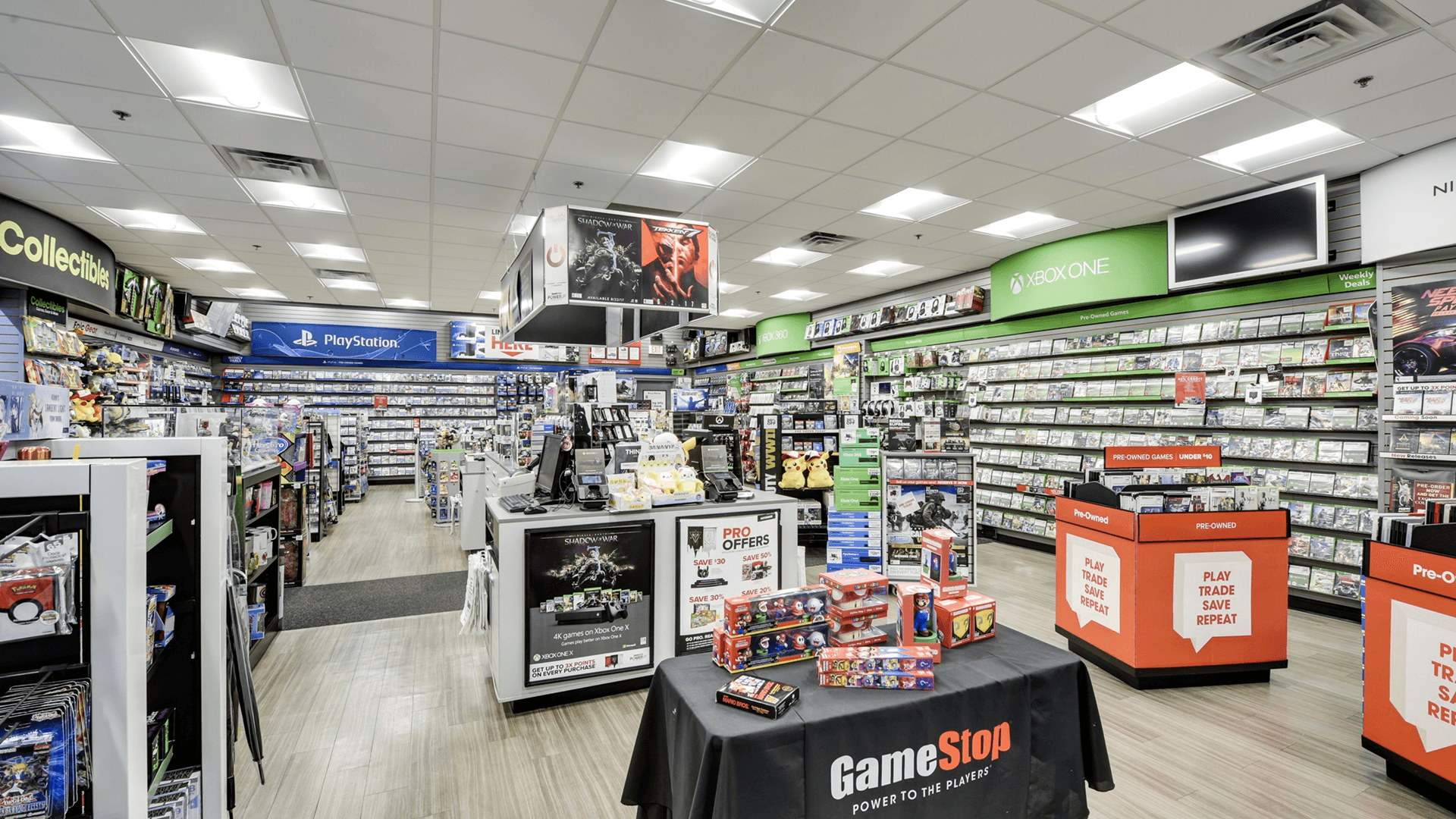 An empty GameStop interior — the literal lost community space.